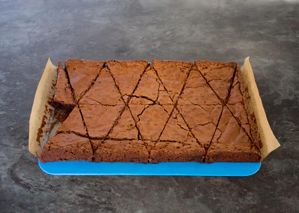 A large brownie cut into triangles