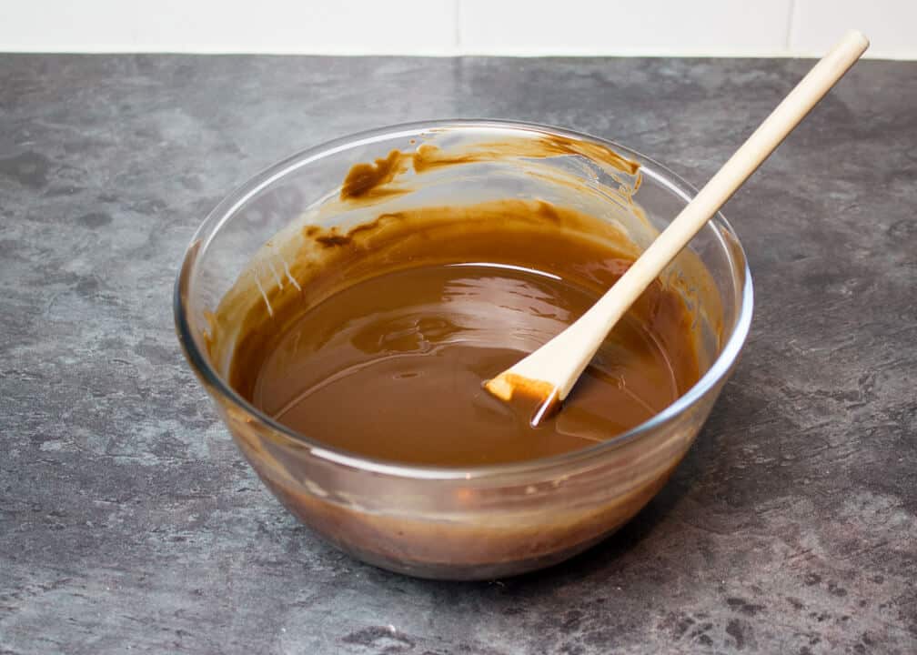 Melted chocolate and butter in a bowl