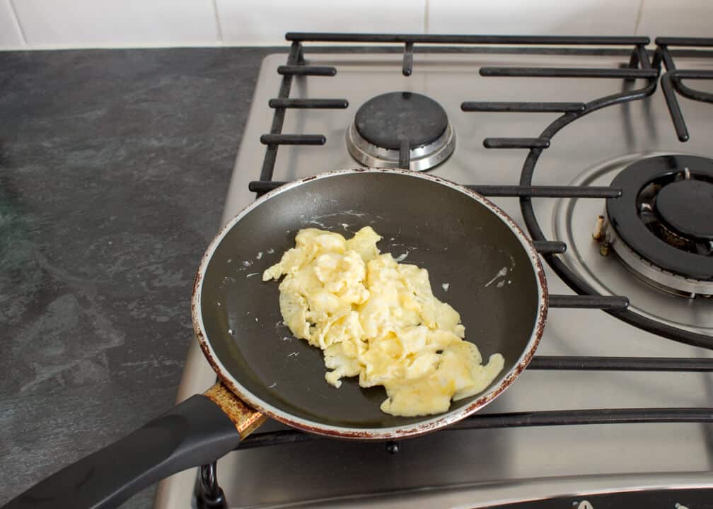 Roughly scrambled egg in a pan